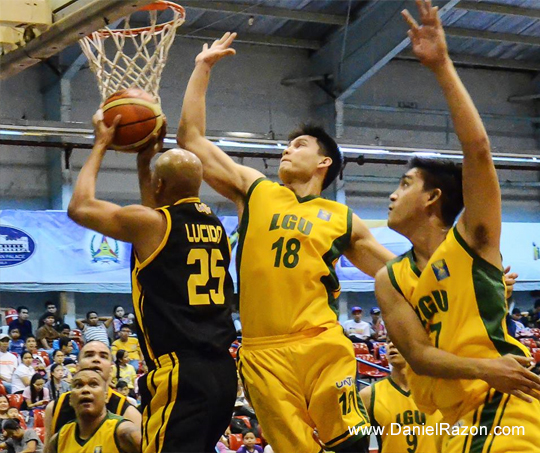 Malacañang forward Vladimir Lucido attempting a reverse lay-up against LGU star Ervic Vijandre. Malacañang wins against LGU, 93-91. (Madelyn Milana | Photoville International)