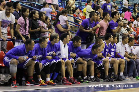 The PNP Responders locks their arms together as a sign of unity as its game with the AFP Cavaliers goes down the wire. The Responders escapes the Cavaliers, 71-69. (Photo by: Prince Maverick Medina Marquez | Photoville International)
