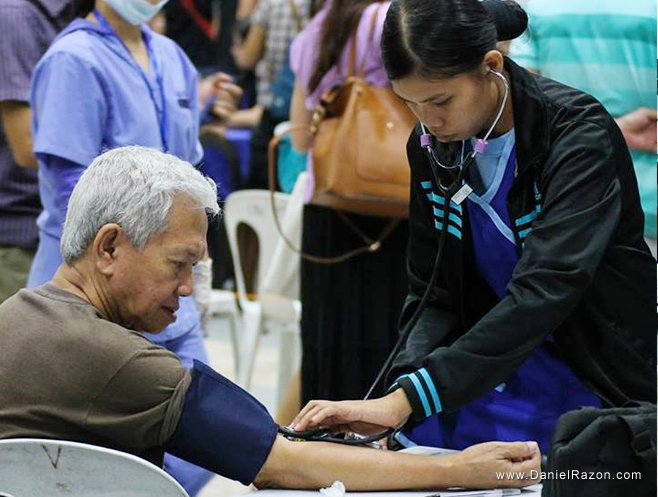 Volunteer healthcare professionals provide invaluable knowledge and support to strengthen medical assistance effort during the monthly People's Day event. (Photo: Photoville International)