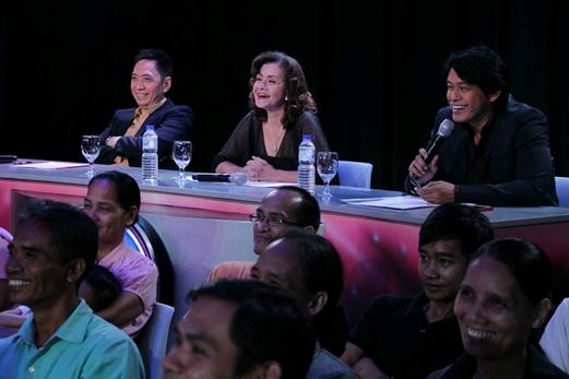 The judges comment on one of the song finalists during the August monthly finals of A Song of Praise (ASOP) TV Music Festival.