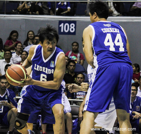 Atoy Co tries to penetrate while Jerry Codiñera assists him during the exhibition game of PBA Legends vs. Team All Stars on Game 2 of UNTV Cup Season 1 Finals last November 5, 2013. (Photo courtesy of Photoville International)