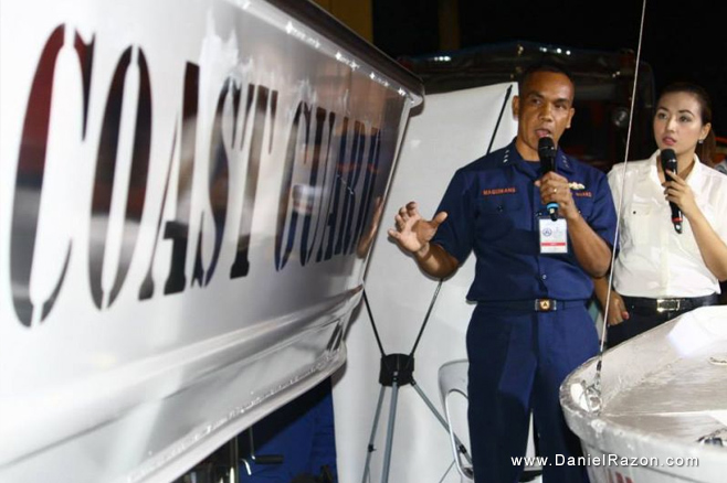 At Philippine Coast Guard’s exhibit area, an officer gives information about their equipment used for rescue operations during UNTV’s 1st Rescue Summit on June 26, 2014 at the World Trade Center. (Photo courtesy of Photoville International)
