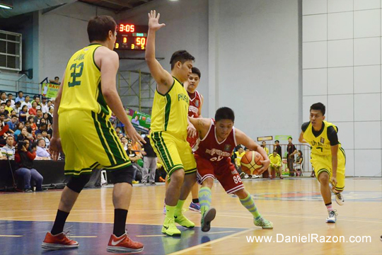 Three PhilHealth players stop HOR’s Rep. Gerald Gullas from driving for a lay-up in UNTV Cup Season 2 Elimination Round at the Ynares Sports Arena, Pasig City, Philippines on March 23, 2014.  PhilHealth – Your Partner In Health escaped with the victory over HOR Solons with the score 81-75. (Joy Reyes | Photoville International)