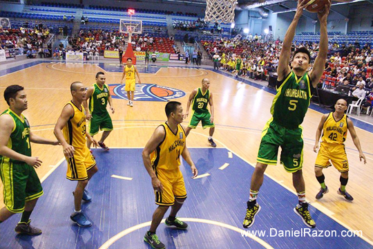 Alex Noriega (#5) skies for the defensive rebound in PhilHealth’s match against the Malacañang Patriots last week. PhilHealth got the win and aims to replicate their victory on Sunday against the House of Representatives Solons. (Rodel Lumiares | Photoville International)