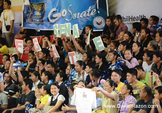 Supporters of Team Senate Defenders cheer during the UNTV Cup Season 2 Elimination Round held at the Meralco Gym, Ortigas, Pasig City, Philippines on March 9, 2014.  Team Malacañang Patriots wins over Team Senate Defenders with the score 81-75. (Charlie Miñon | Photoville International)