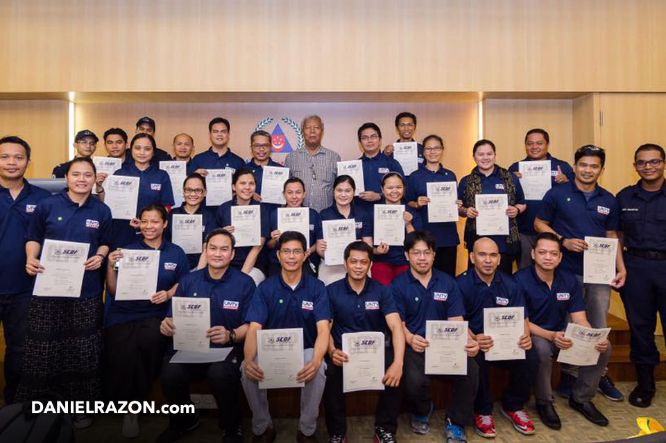 After their successful completion of the rescue training from the SCDF, the UNTV news-and-rescue team of Singapore pose for a group photo (Source: Photoville International).